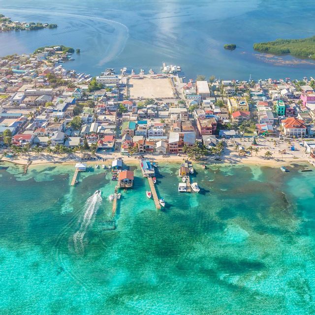 Caye Caulker from above Aerial view of Caye Caulker and its turquoise water, Belize