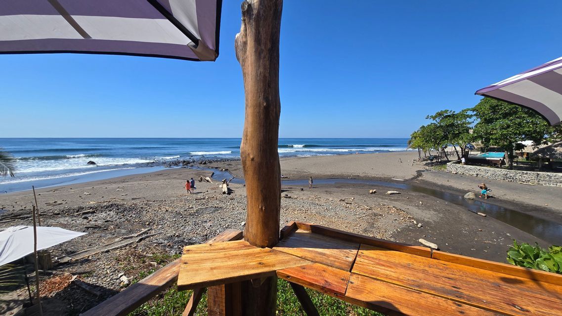 Black sand beach on the Pacific surf coast of El Salvador