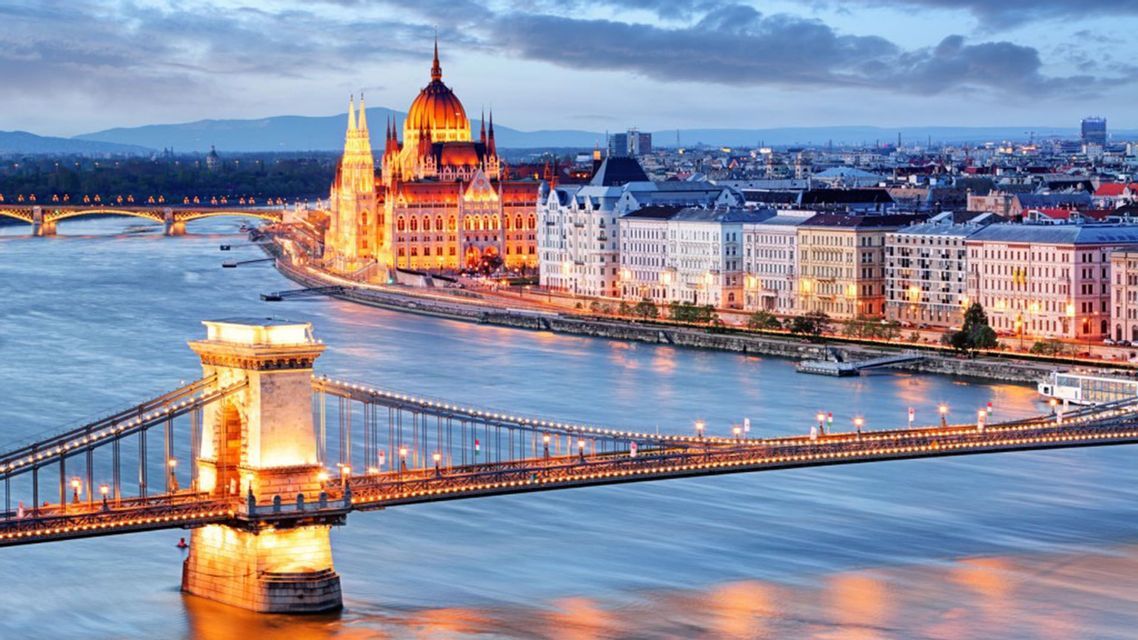 The Hungarian Parliament and the Budapest skyline above the Danube river.