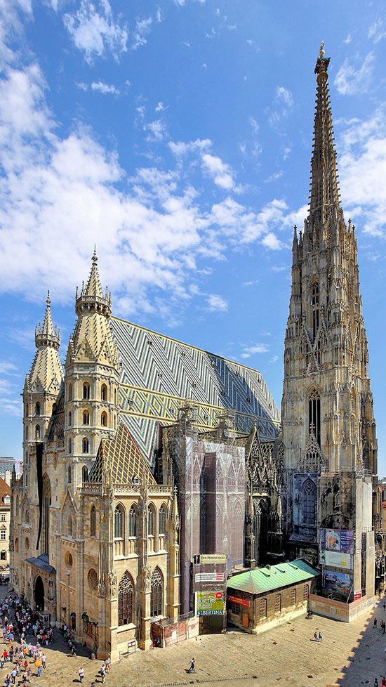 The patterned tiled roof and spires of St Stephen's Cathedral in Vienna.