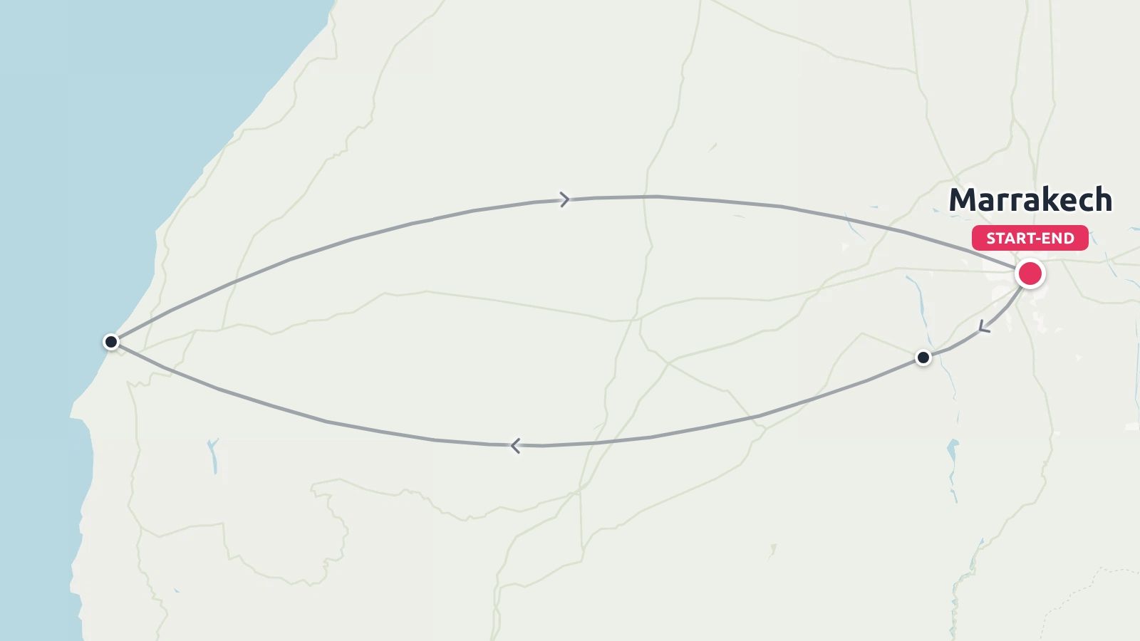 A travel route map displaying a loop itinerary starting and ending in Marrakech, connecting inland areas to the coast.