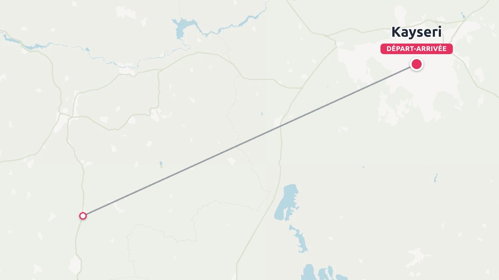 Une carte d'itinéraire de voyage montrant une ligne grise droite reliant Kayseri à une destination du sud-ouest.