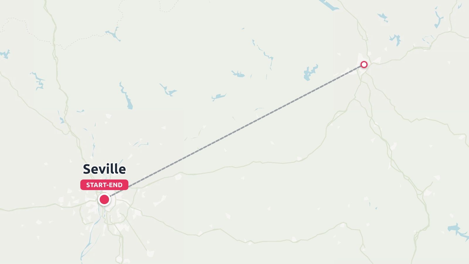 A travel route map showing Seville marked as the start and end point connected to another location by a dashed line.