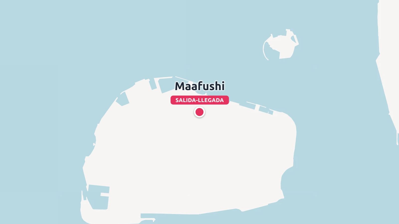 Un mapa de la isla de Maafushi que muestra un marcador de ubicación rojo con la etiqueta salida-llegada rodeado de agua azul