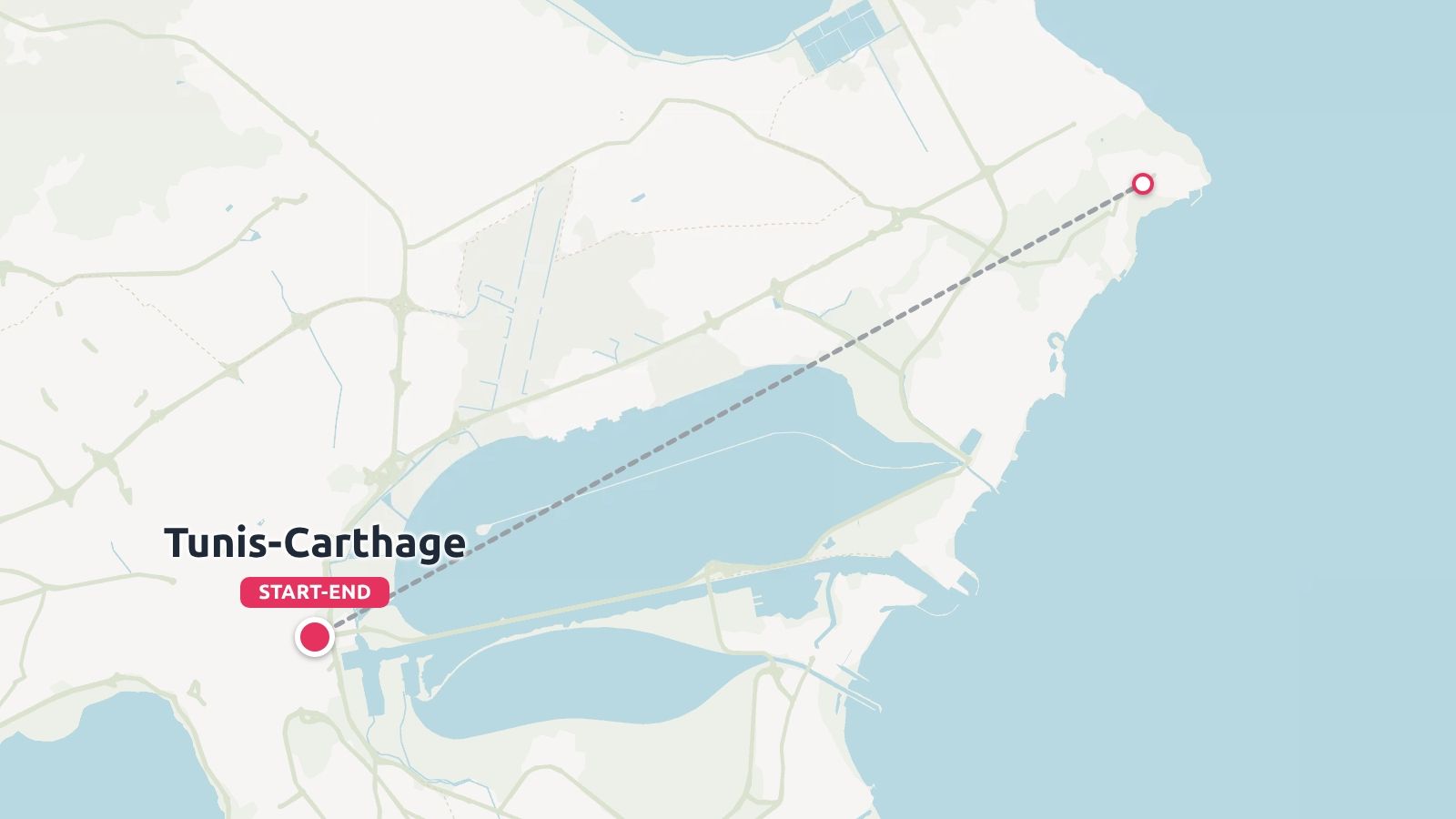 Travel route map showing Tunis-Carthage with a start and end location marker connected by a dashed line.