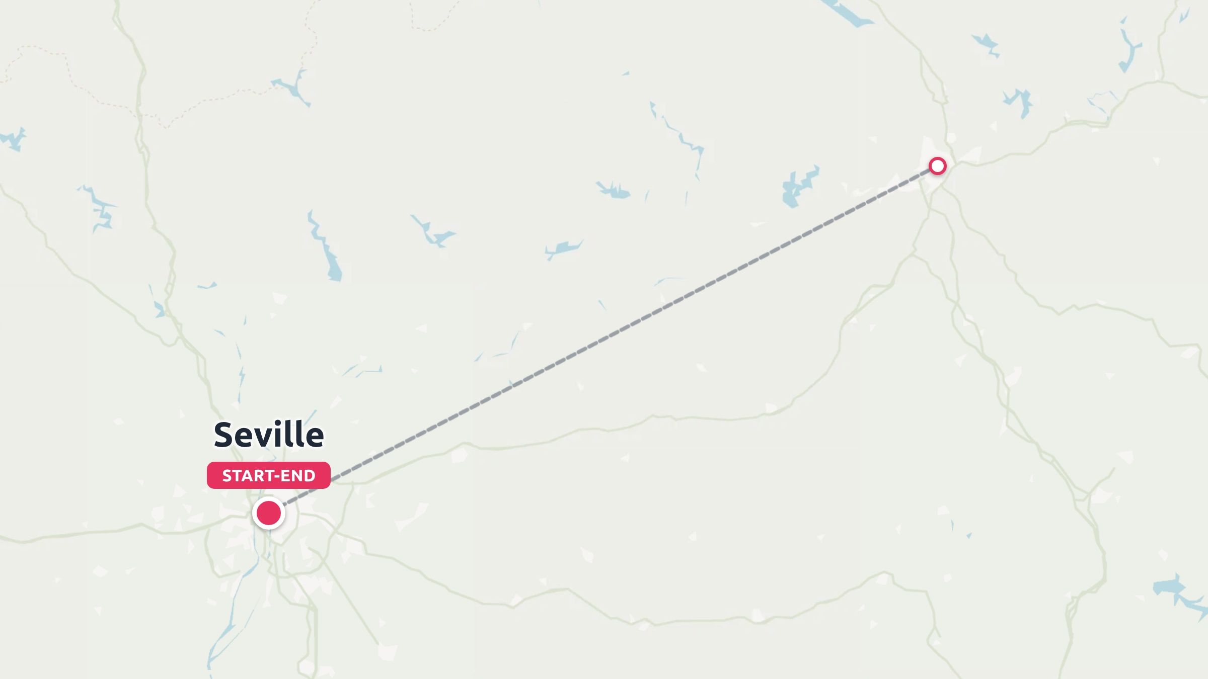 A travel route map showing a dashed line connecting Seville as the start and end point to a destination.
