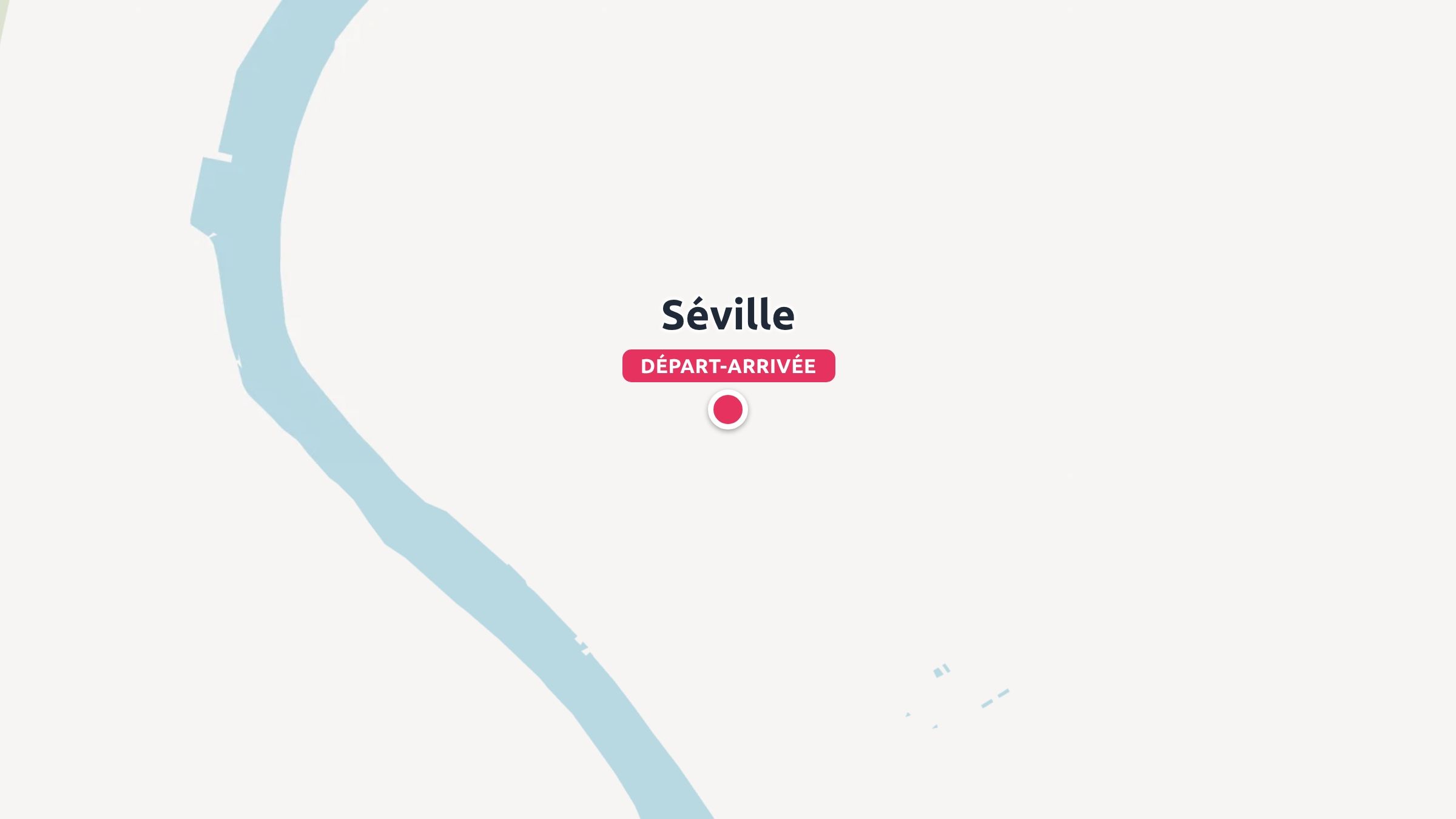 Une carte marquant Séville avec une épingle rouge étiquetée départ-arrivée à côté d'une rivière bleu clair