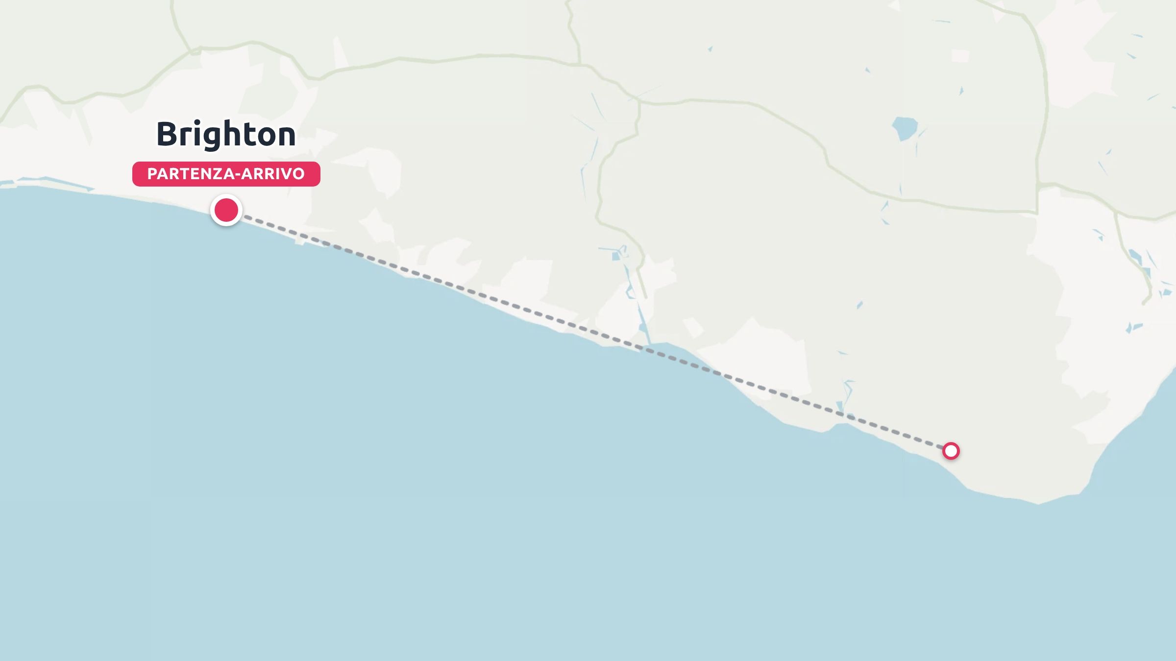 Una mappa di un itinerario di viaggio che mostra una linea tratteggiata che collega Brighton lungo la costa a un vicino punto costiero.