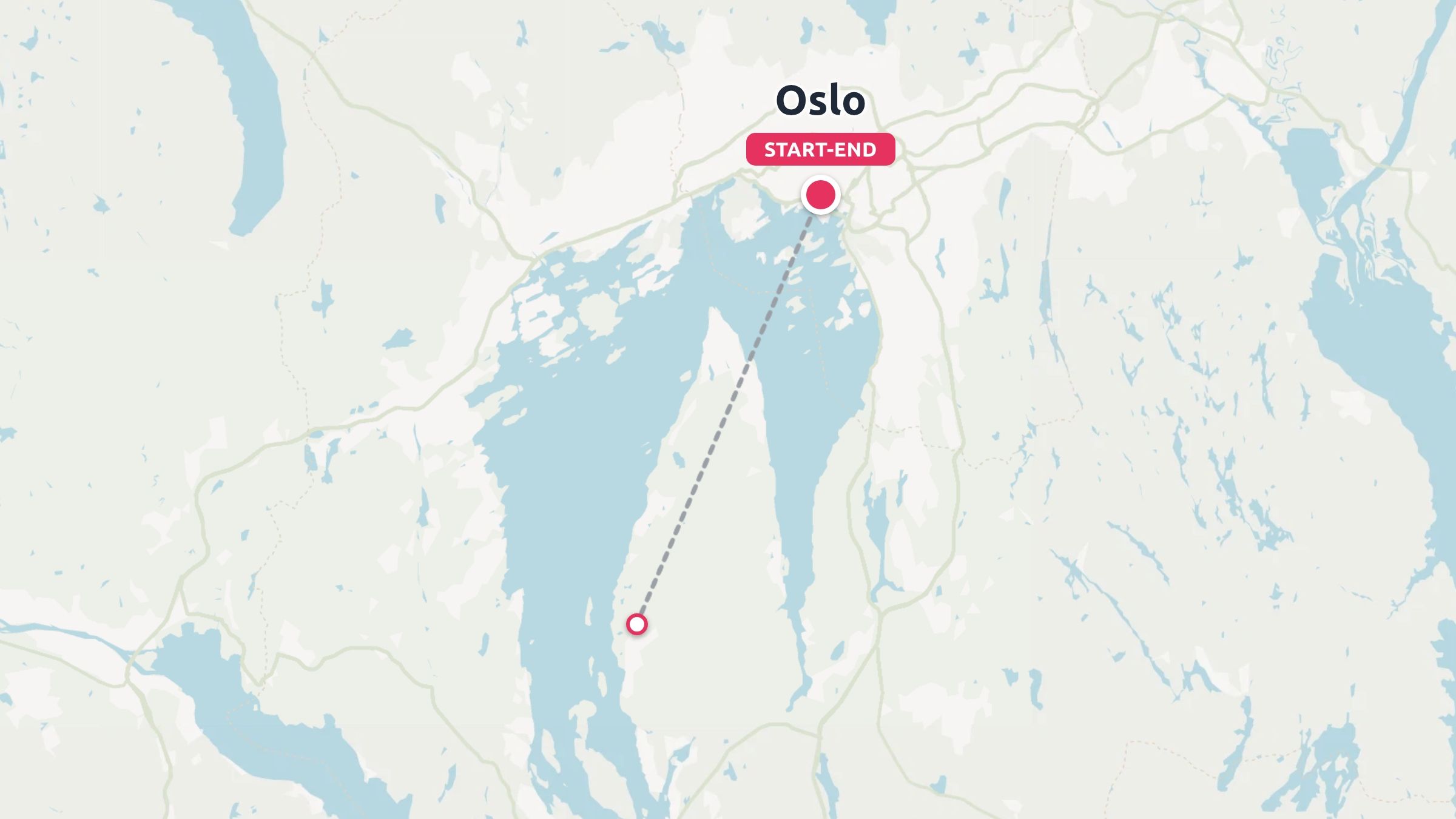 A map of Oslo showing a travel route marked with a start and end point connected by a dashed line to the south.