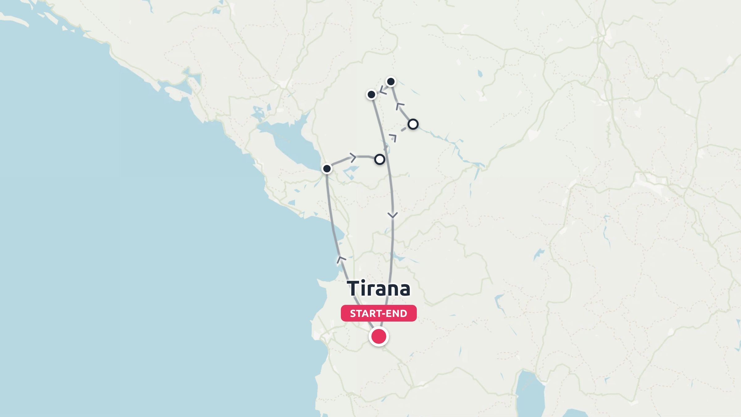 Travel route map starting and ending in Tirana, showing a loop trail with multiple stops marked in northern Albania.