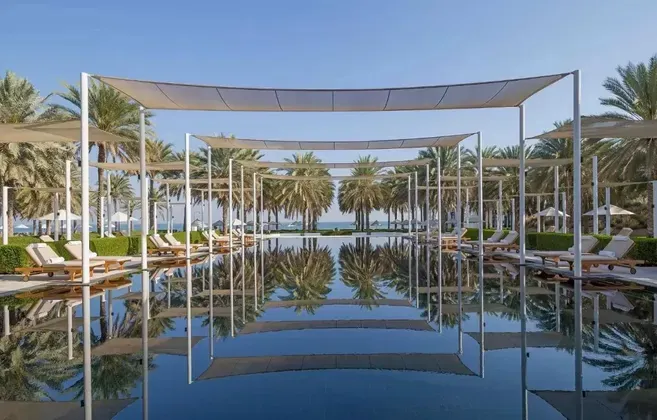 Oman-resort-pool-trees-landscape