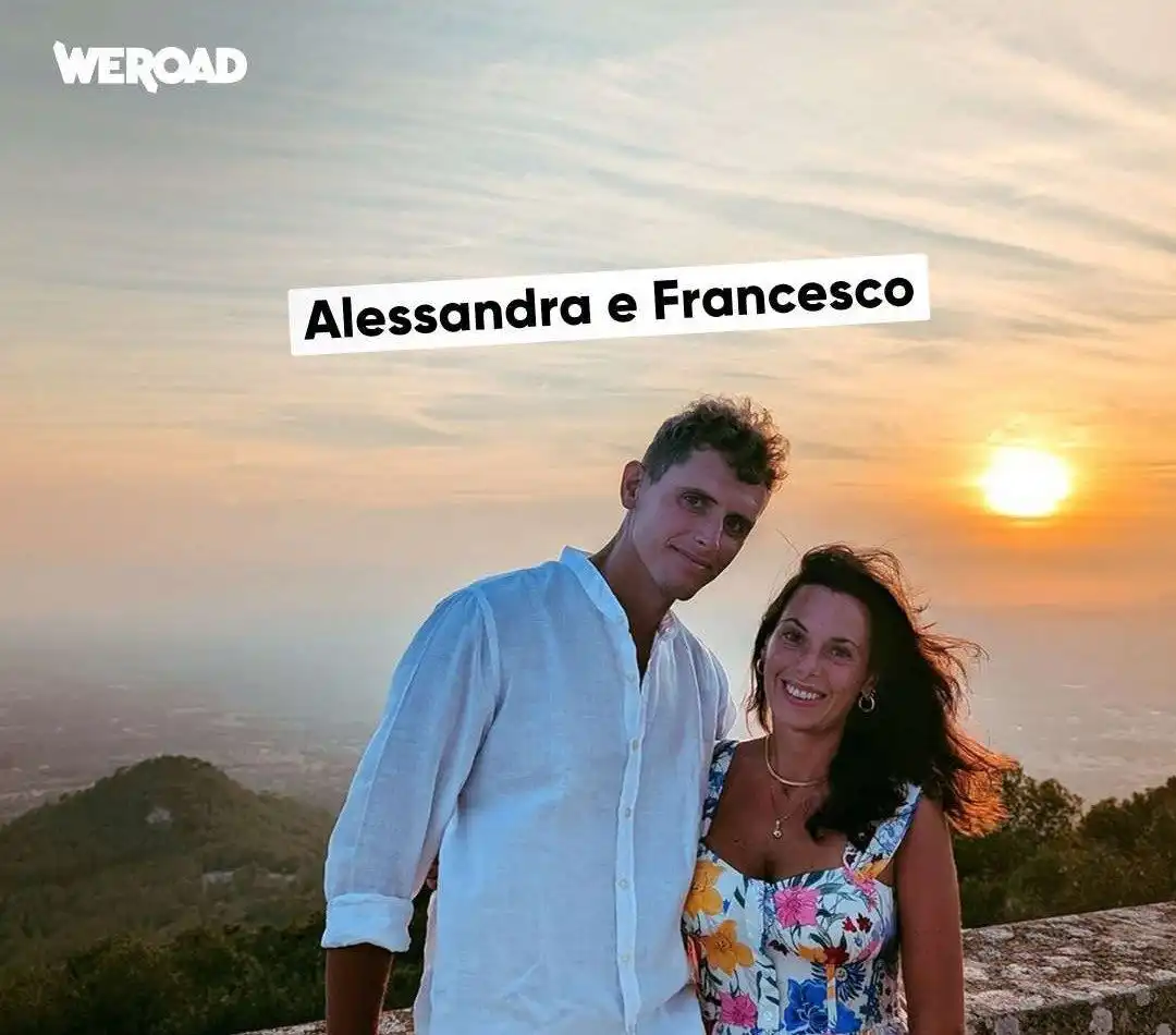 Alessandra and Francesco at sunset, a couple who met on a WeRoad trip to Corfu